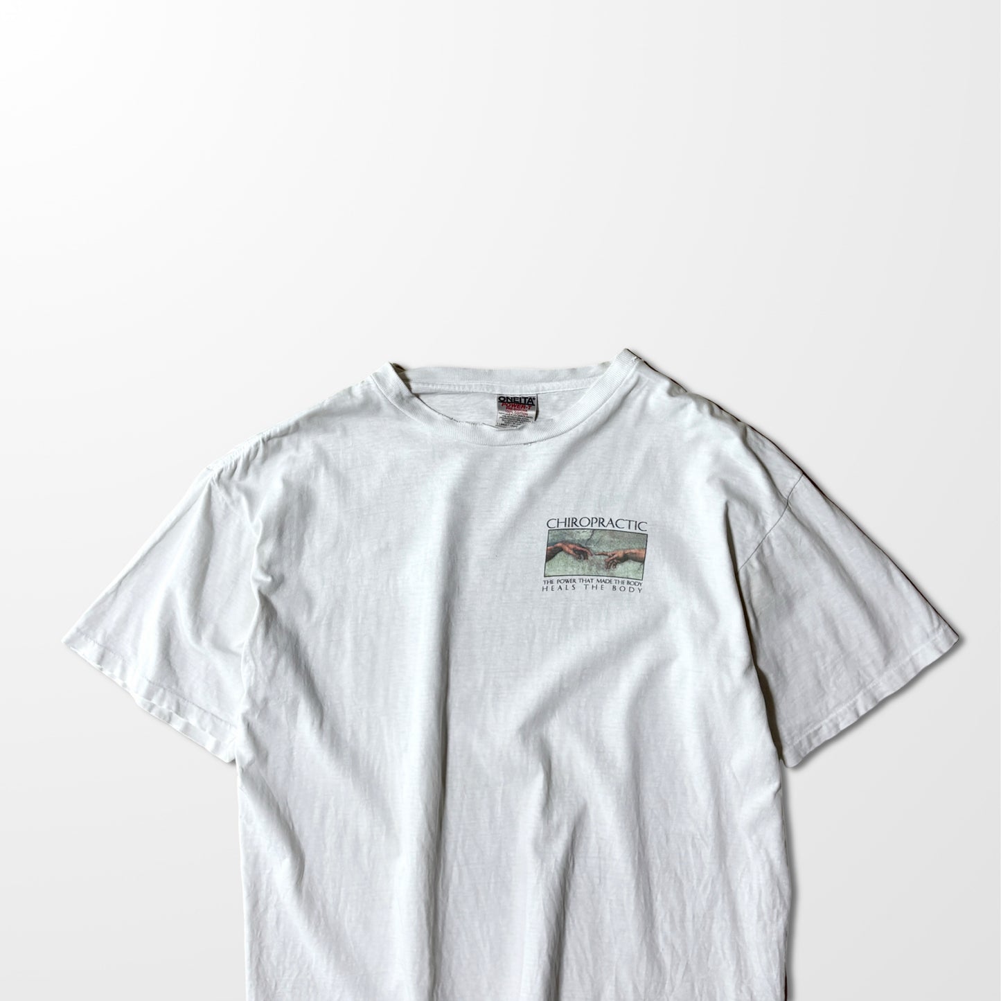 ONEITA Chiropractic Michelangelo Print Tee – L / White / 1995