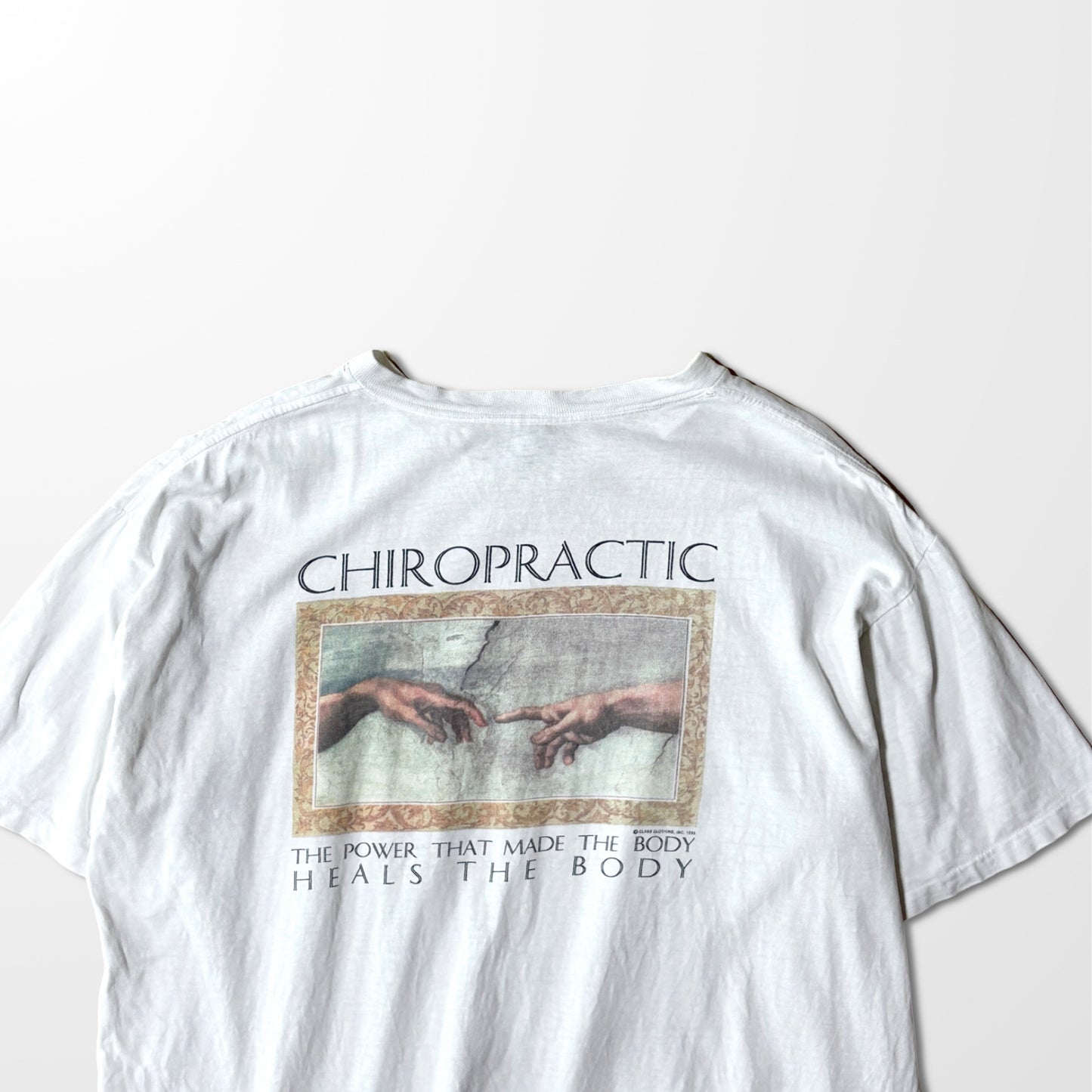 ONEITA Chiropractic Michelangelo Print Tee – L / White / 1995