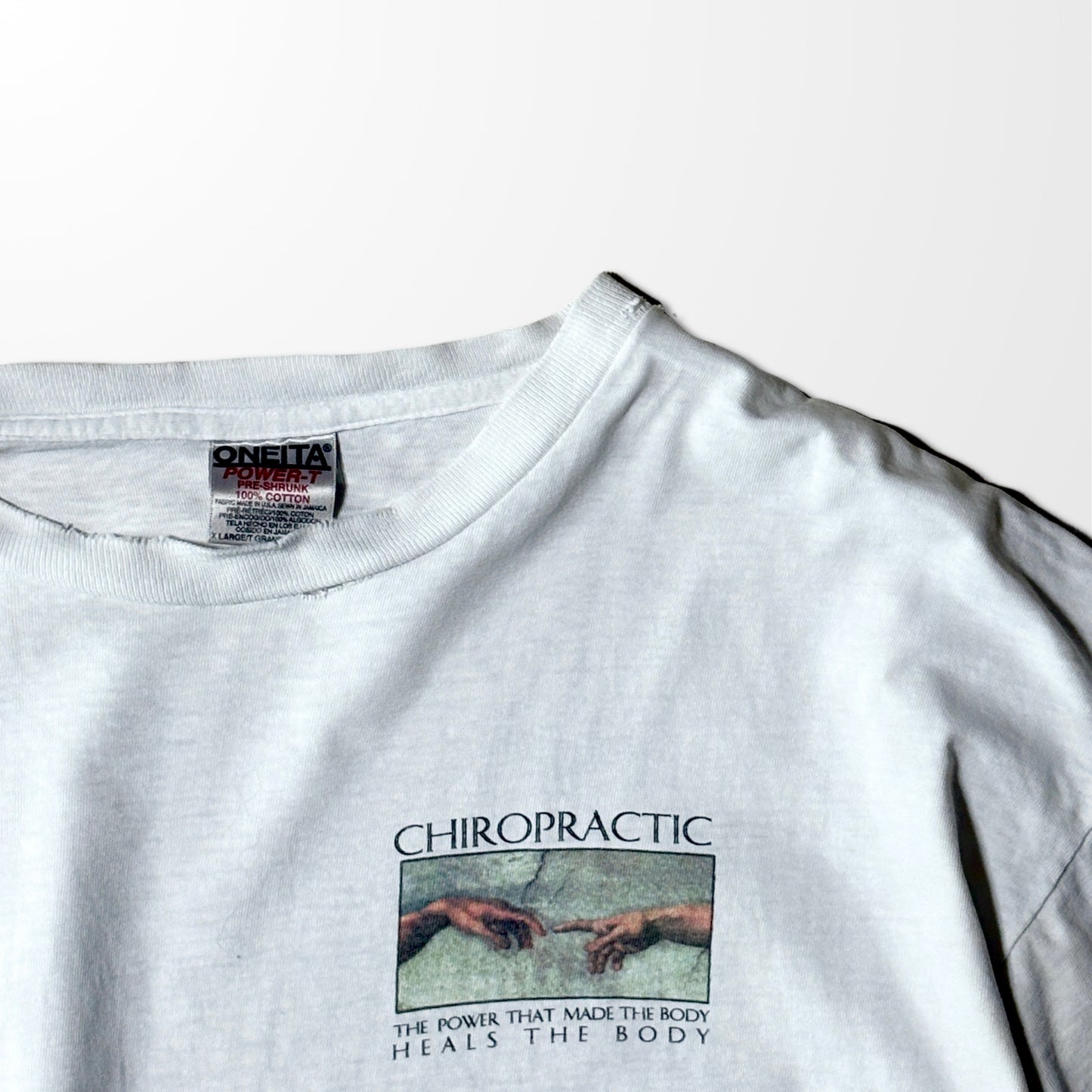 ONEITA Chiropractic Michelangelo Print Tee – L / White / 1995